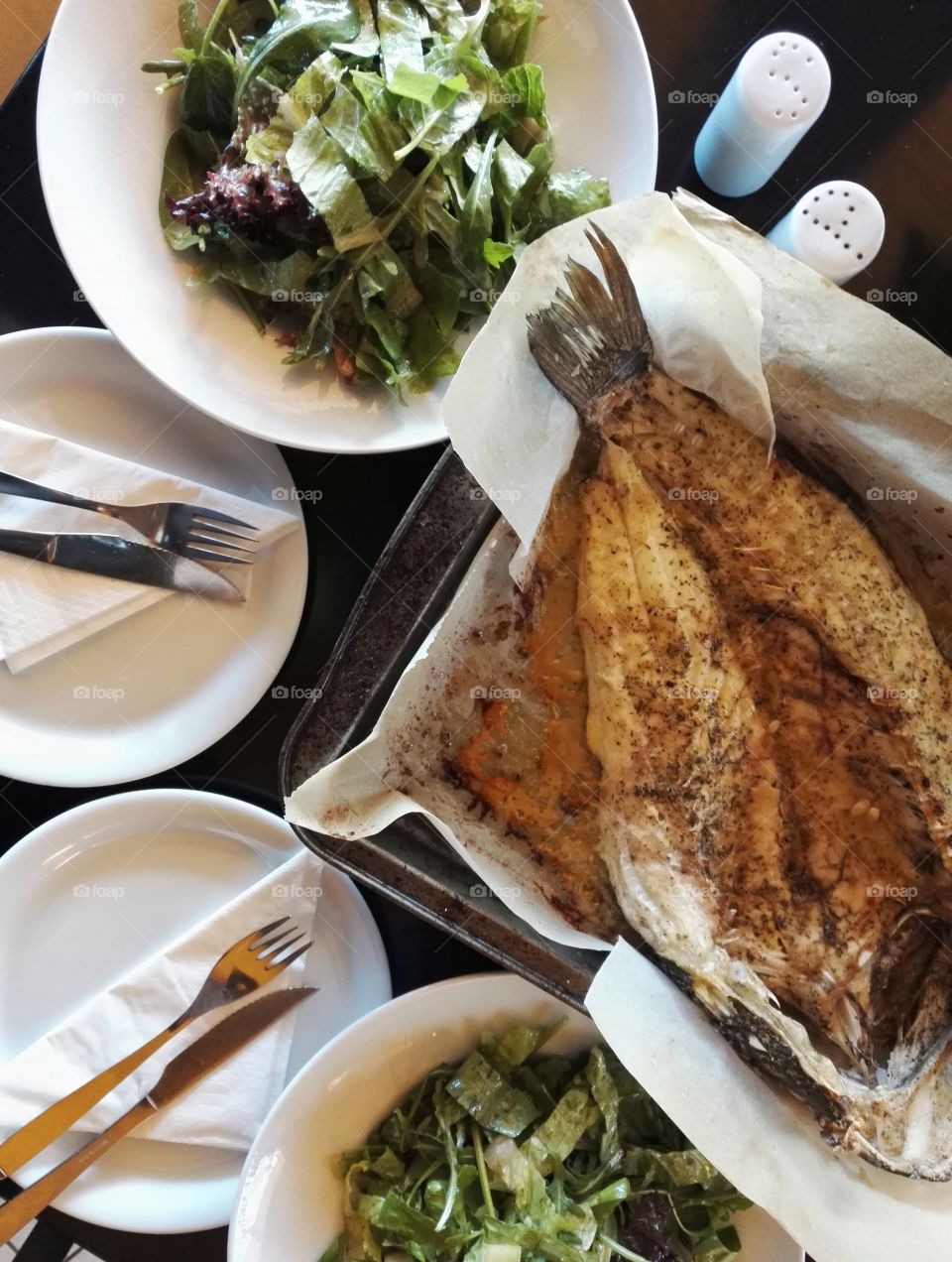 fresh sea bass with green salad