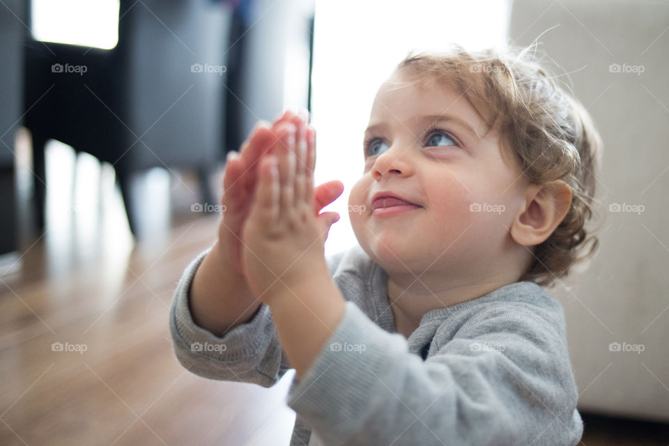 Close-up of a girl clapping