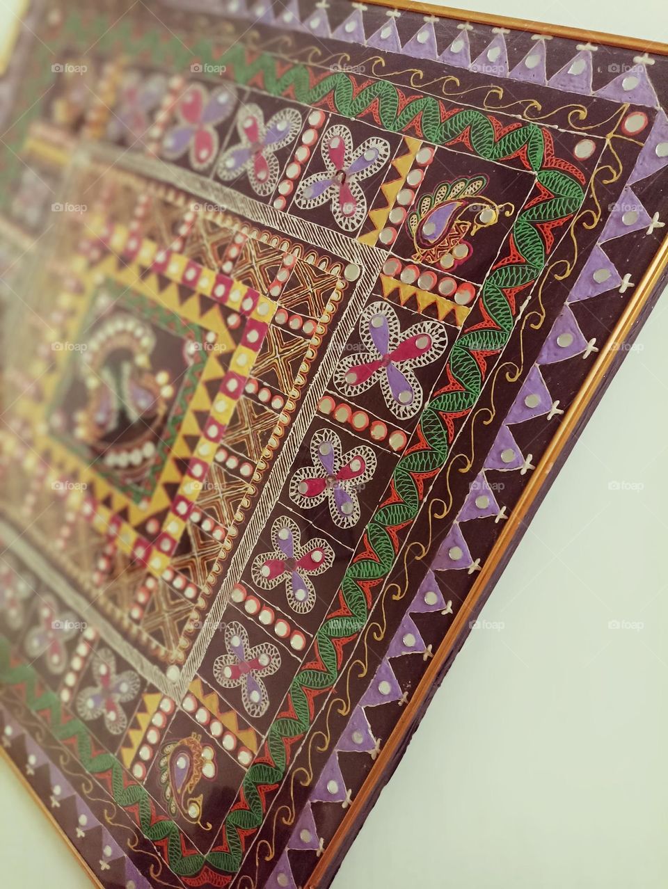 hand made art piece drawn on cotton cloth used fabric colors beautiful complementary colors.