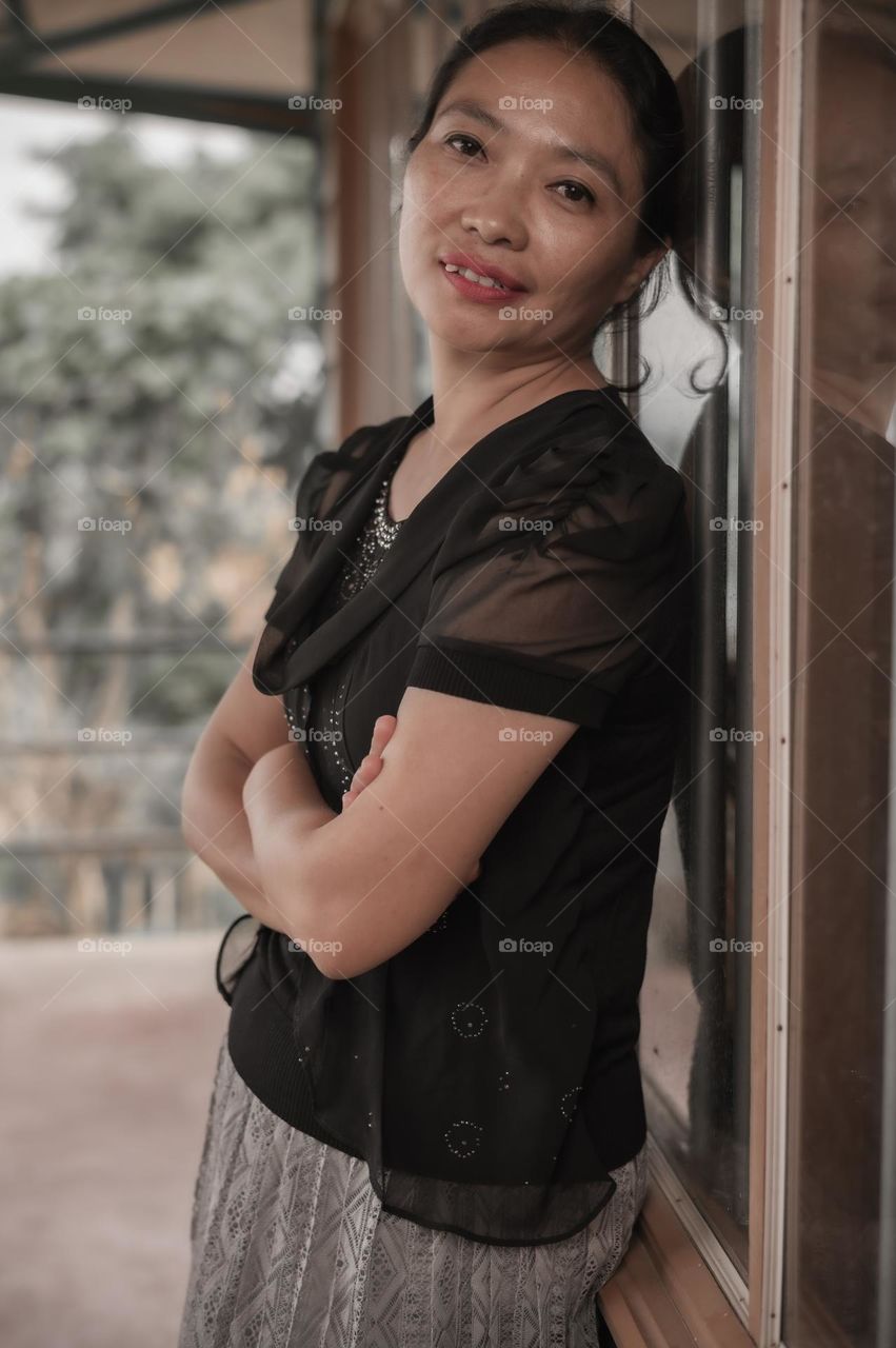 A simple yet charming portrait shot of a mother of two.