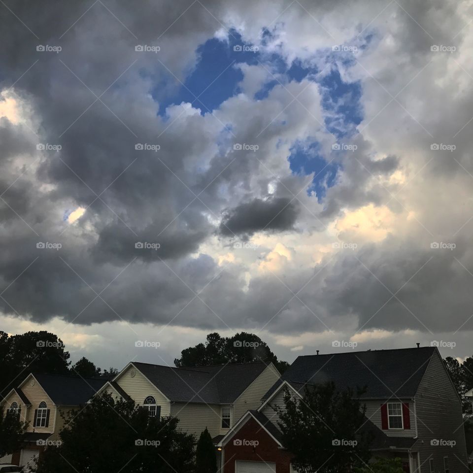 Storm clouds and blue sky