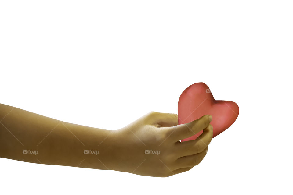 Isolated Hand holding a red candy shape heart on a white background with clipping path.