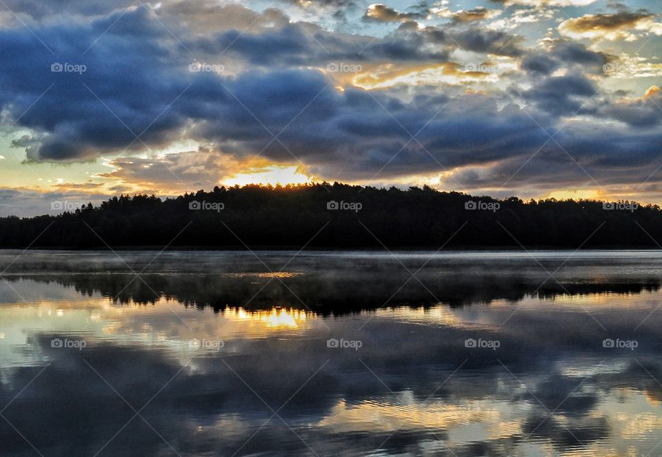 golden sunrise over the lake in polish countryside