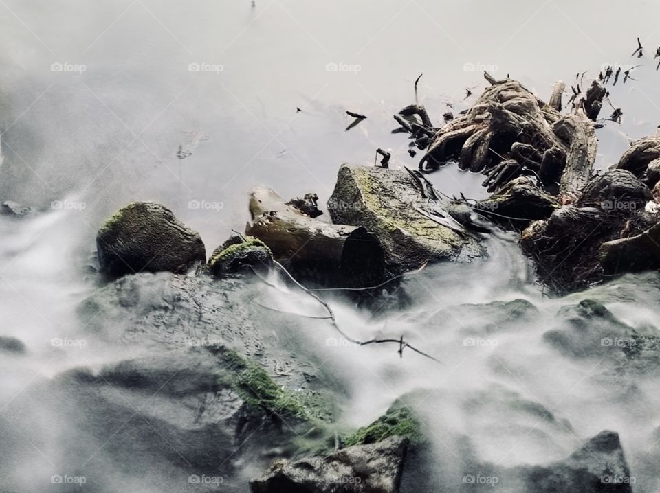 Flow of water into the pond at Fairmount Park’s Lake Evans located in Riverside, California 