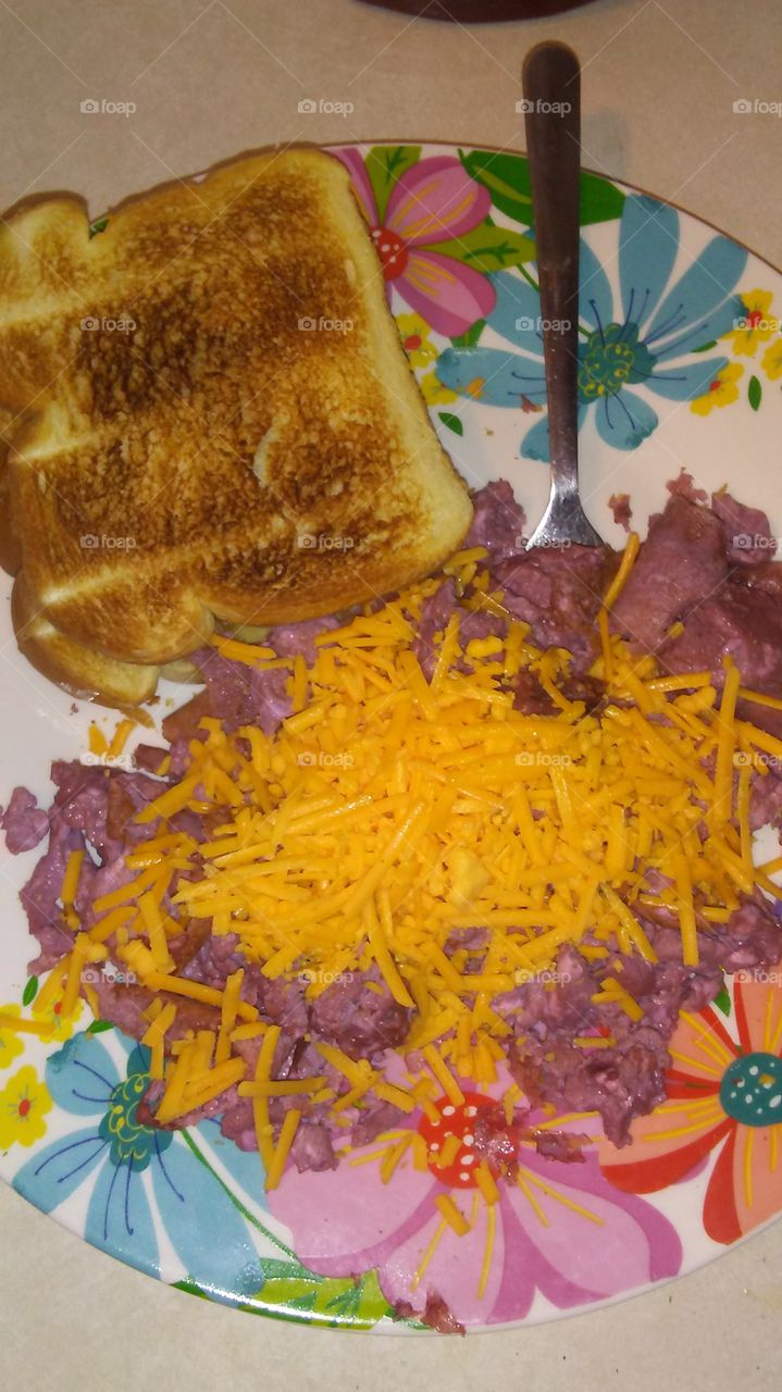 purple scrambled eggs with cheese