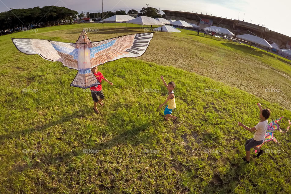 children flying a kite