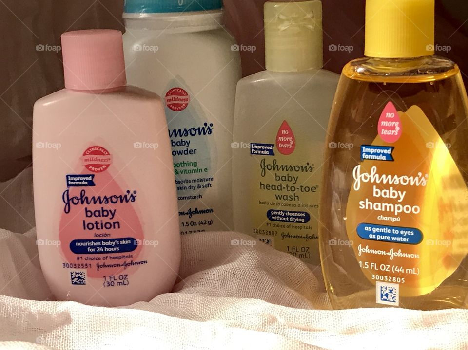 Johnson and Johnson baby products with a soft pink background
