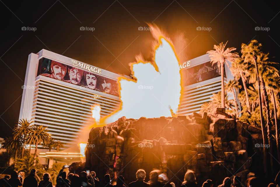 Tourist enjoying a volcano erupting in Las Vegas Nevada in front of the Mirage hotel