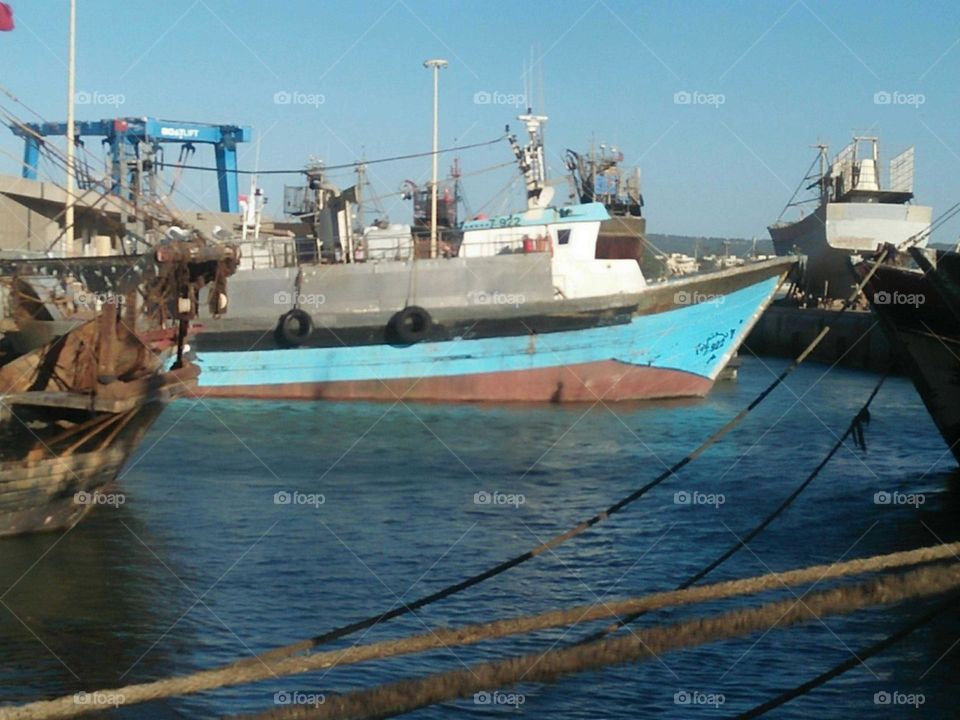 Blue ship in harbour at essaouira city in Morocc