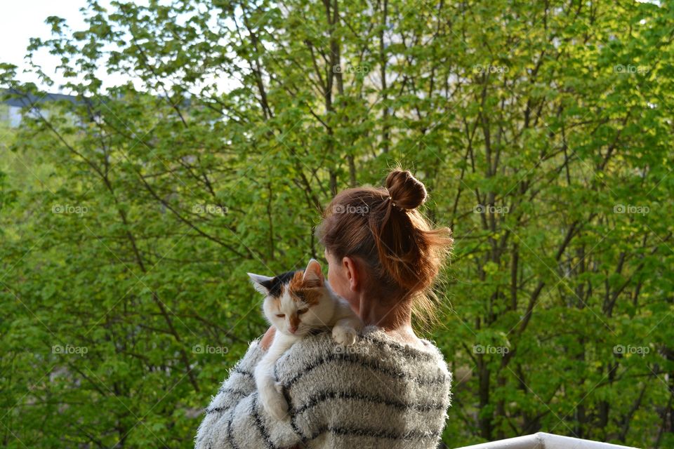 woman and cat family green background, relaxing, love pet