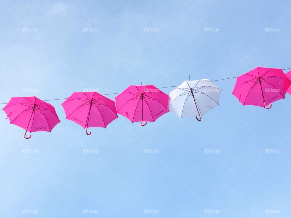 Umbrellas in the sky.