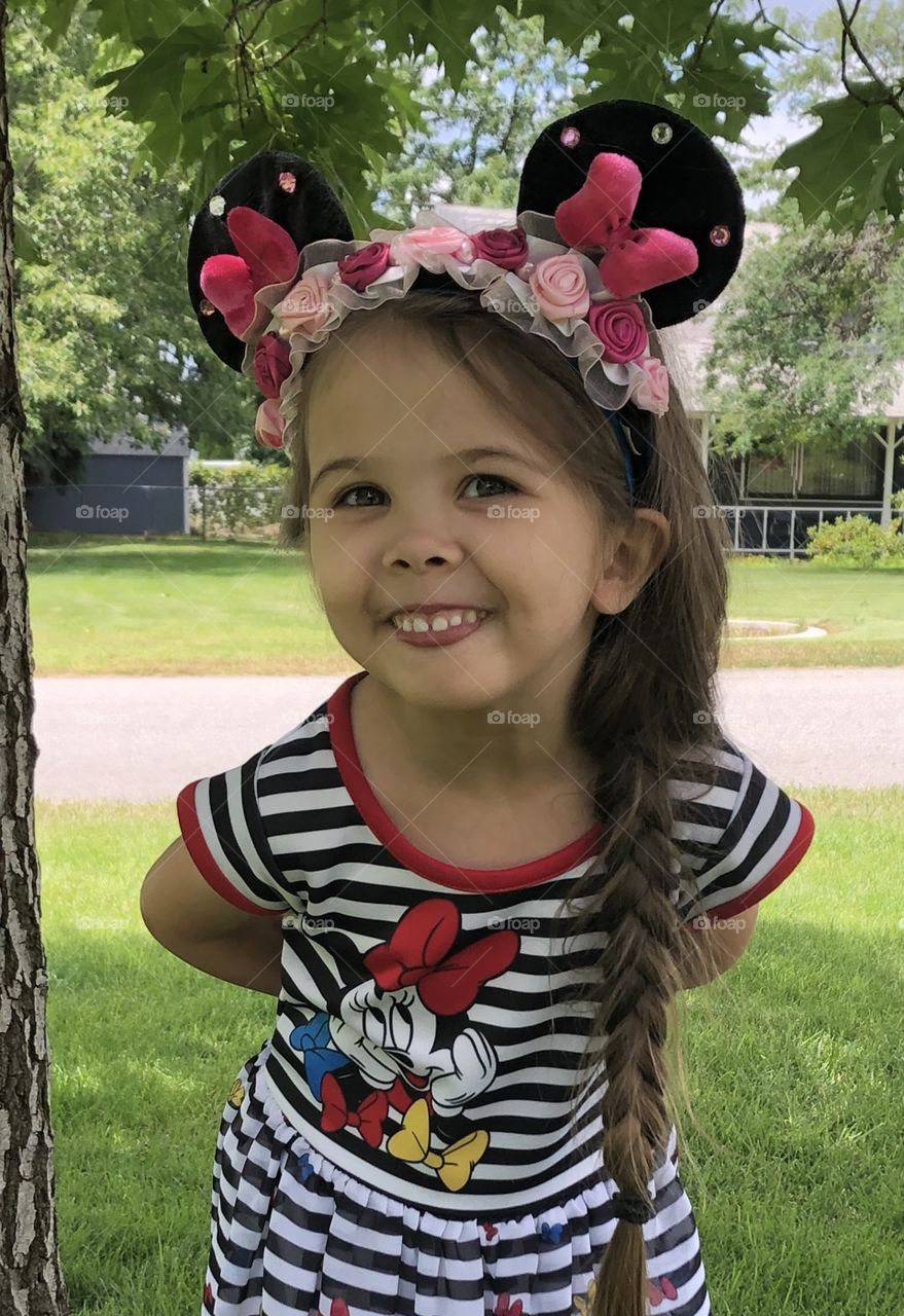 Cute little girl loves Disney Minnie Mouse