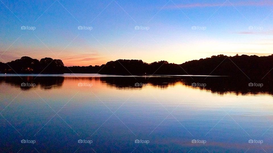 Lake against clear sky