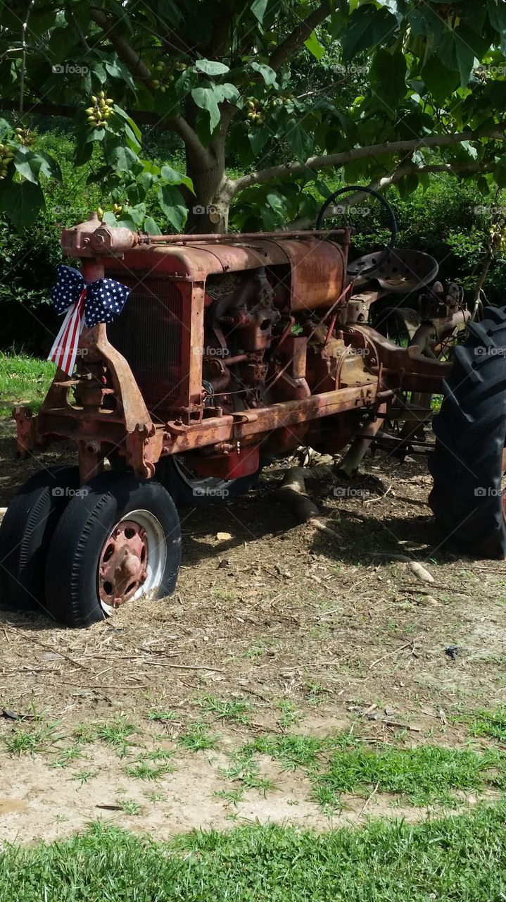 retired tractor. visiting a friends farm and saw old tractor