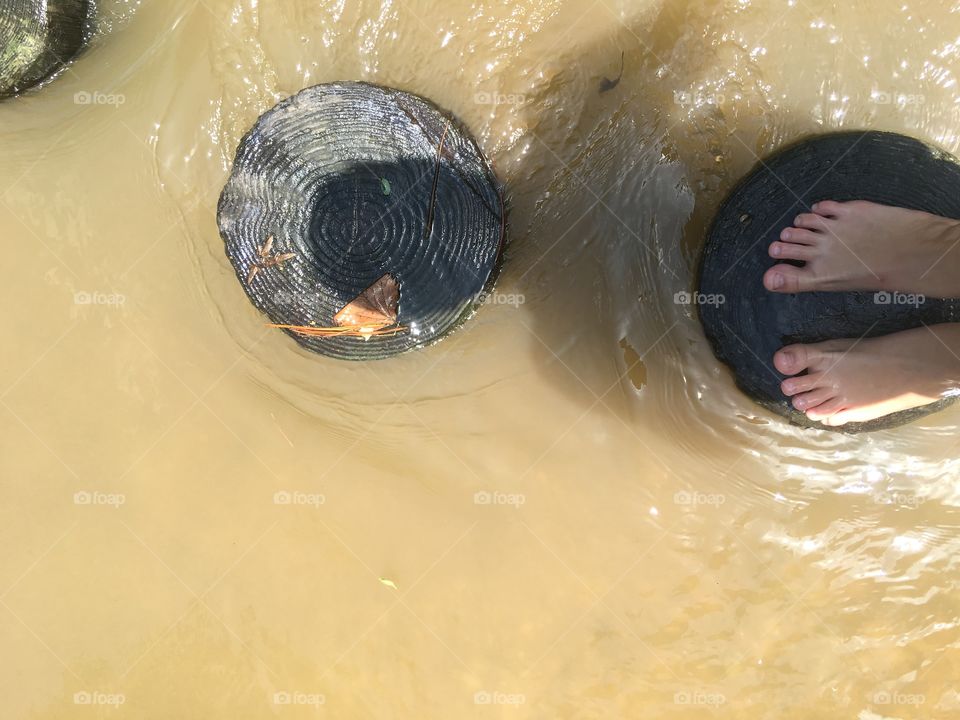 Feet in the creek