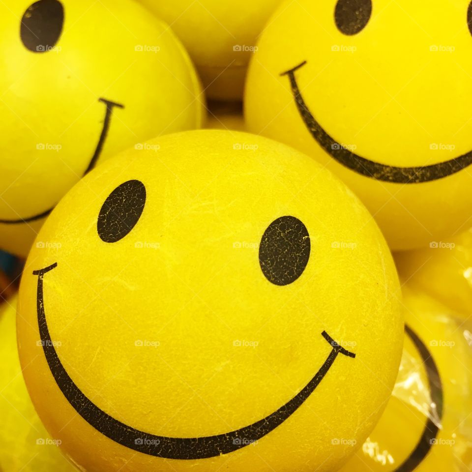 Smiling balls in a toy store.