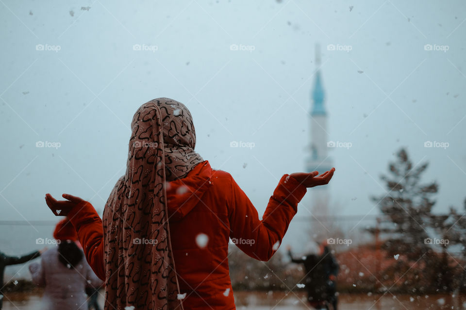 Praying under the snow