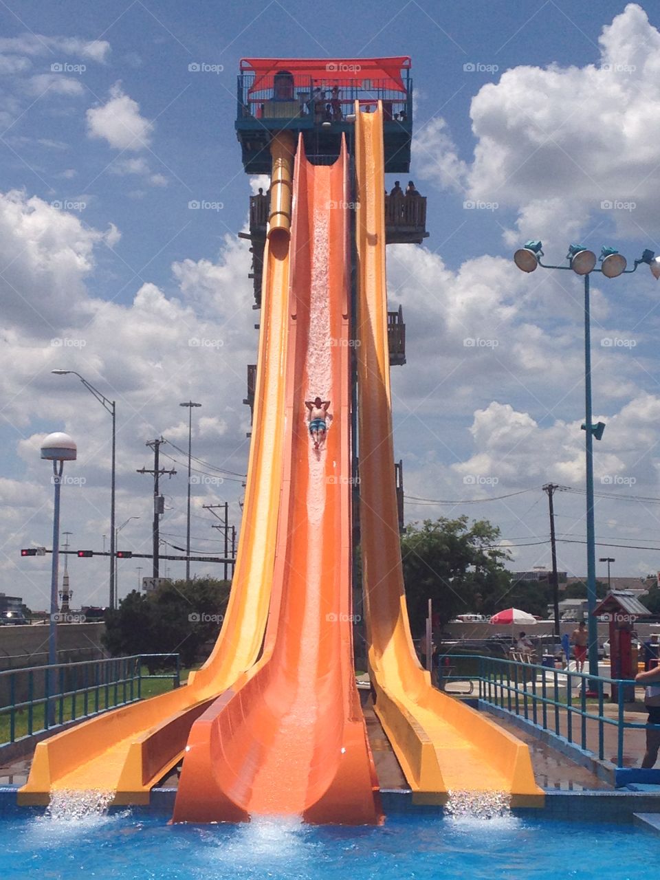 Not me. Man going down water slide at hurricane harbor