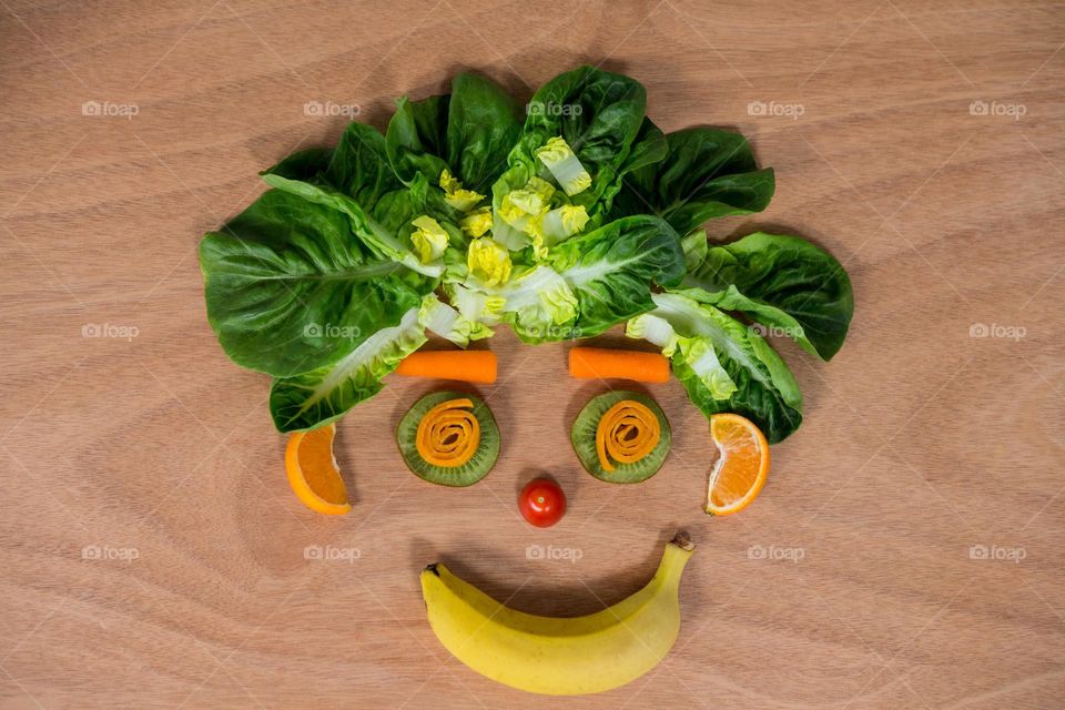 The beautiful face of combined fruits and vegetables.