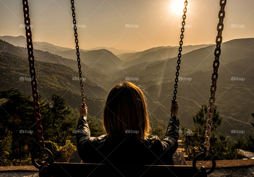 Swinging woman