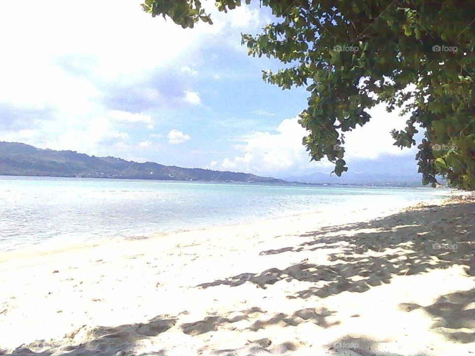 beach natsepa maluku (indonesia) the beauty of the beach is clear blue and beautiful natural scenery there are many in maluku island Indonesia is much in demand by foreign tourists.