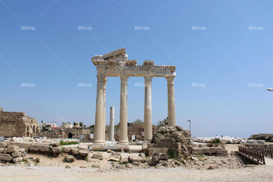 Architectural marvel of Apollon Temple with panoramic coastline views in Side, Turkey. 