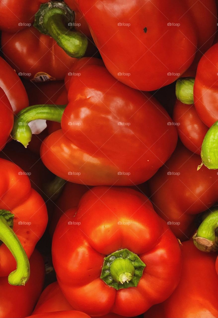 close up view of enticing red bell peppers for sale in an Oregon market ready for delicious snacks and meals