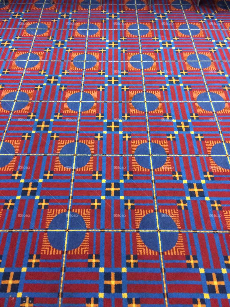 Red. Lue and yellow carpet pattern