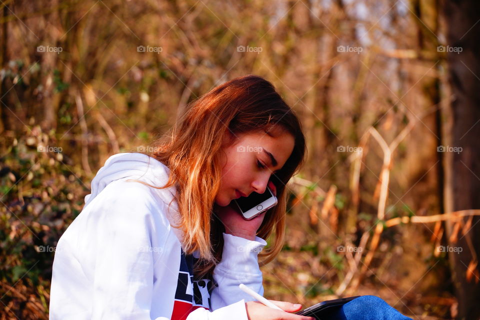 Girl is talking to the phone 