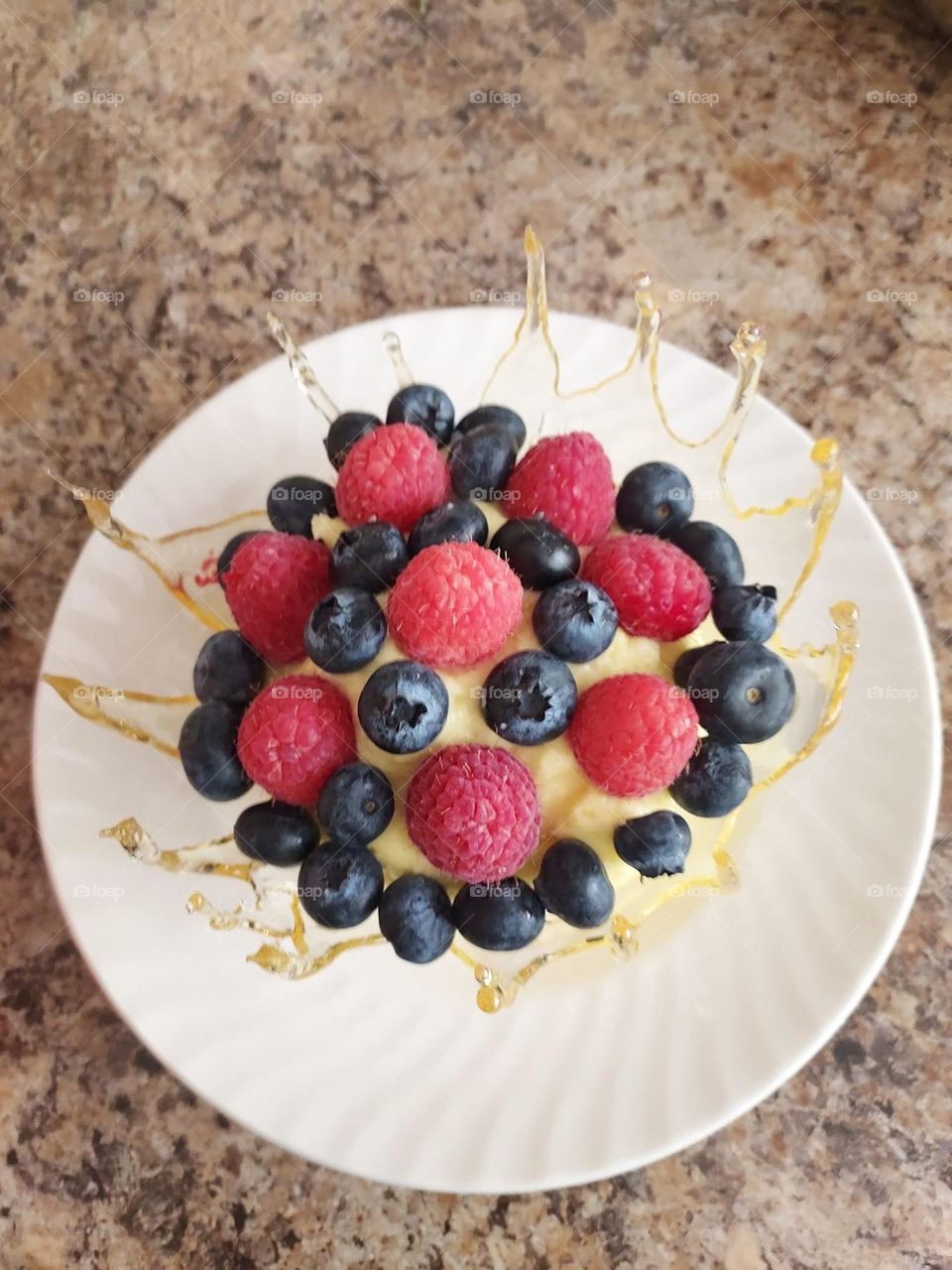 Sweet and fresh for the summer. Another angle of the sugar bowl I made with lemon cheesecake mousse filling top with fresh blueberries and raspberries. 