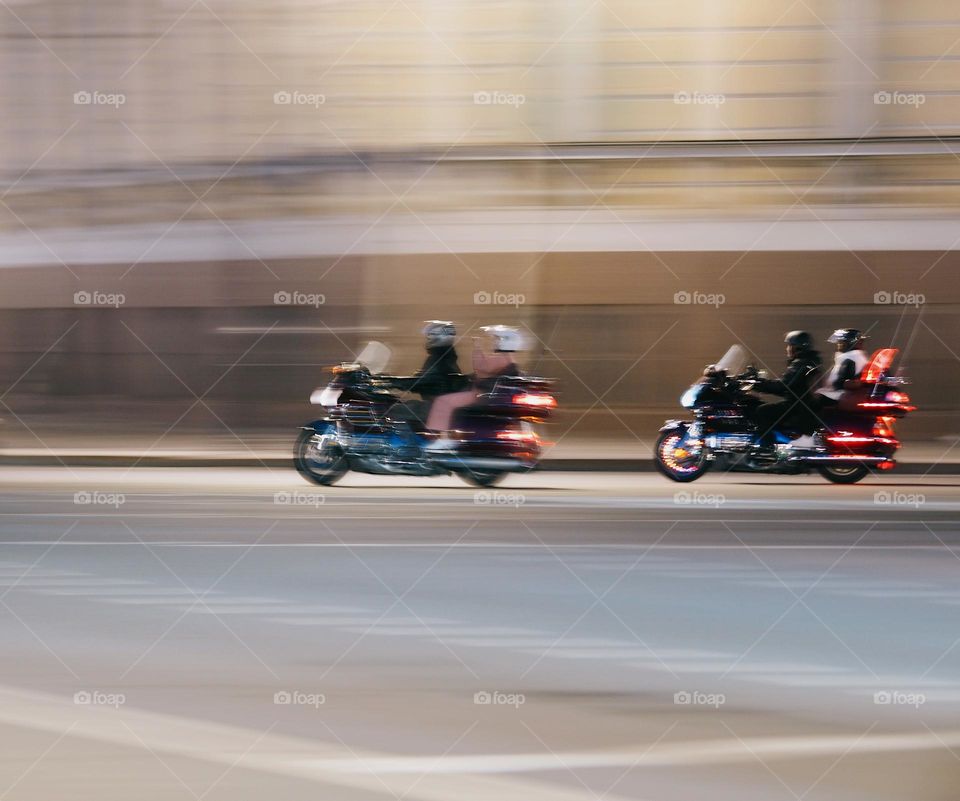 Motorcycles in the night road, long exposure 