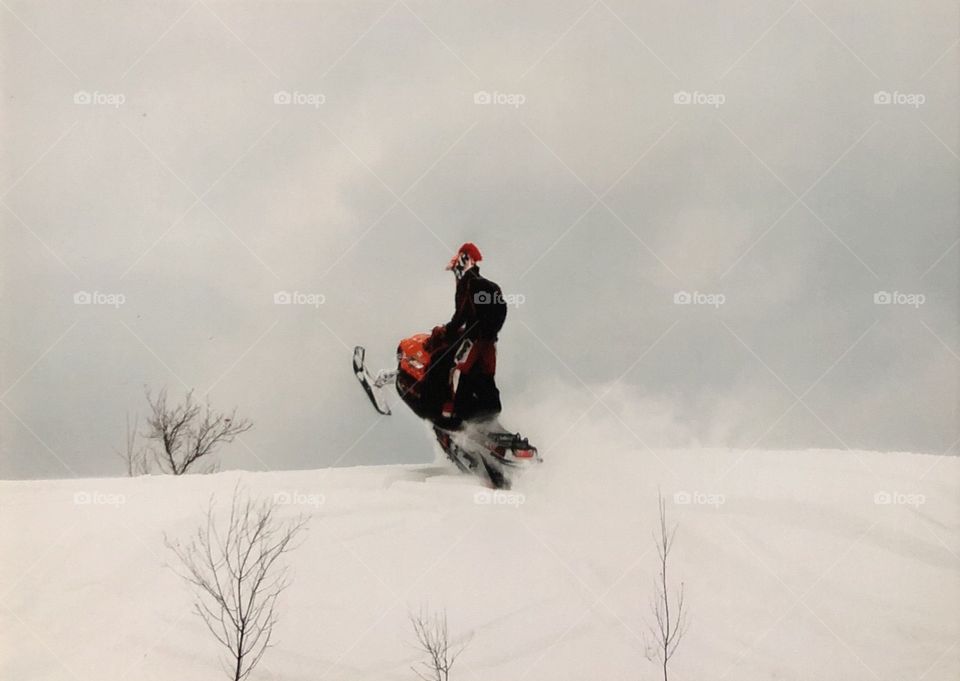 Making the most of our Canadian Winters. Snow sports make for great action shots. The way the powder hangs almost serves as a custom vignette effect. Nothing better than sledding on a nice winter afternoon. 