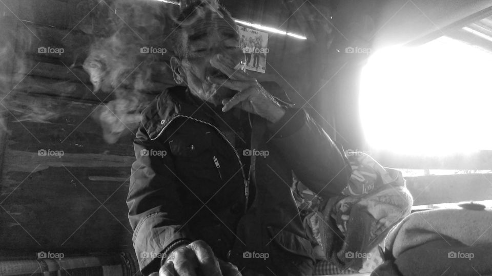 Wicked old shaman on top of a Sumatran coffee Platteau who smoked his tobacco in sweet corn leaves...wonderful time spend ...mentored with certainty 