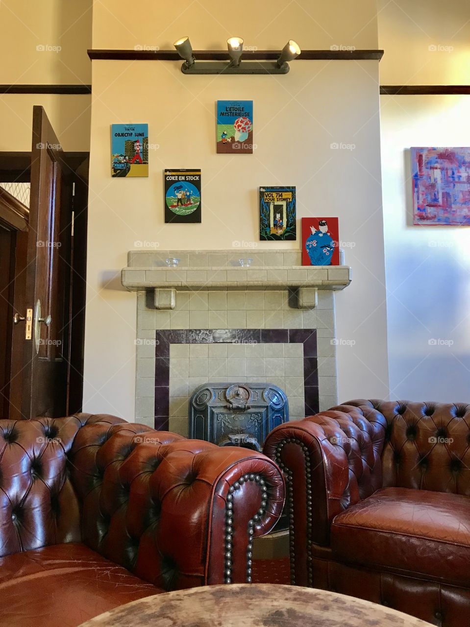 Chesterfield lounges and cast iron fireplace. Leura, Blue Mountains NSW Australia 