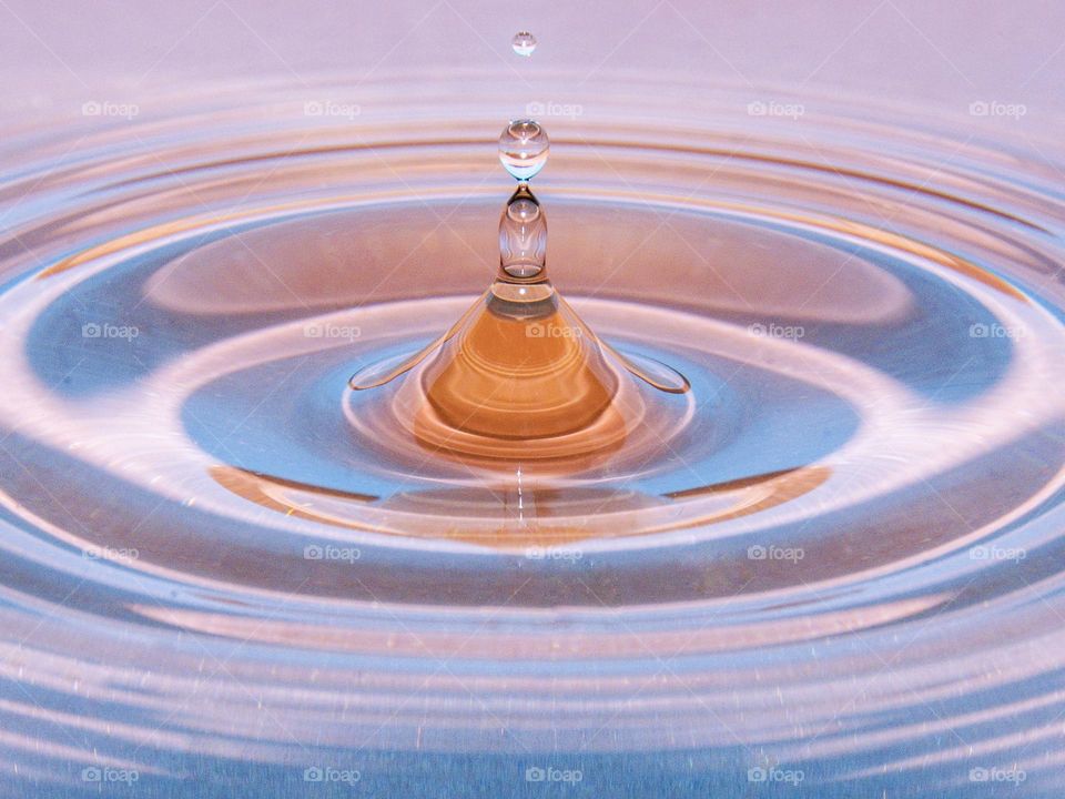 Water drop on a colorful background