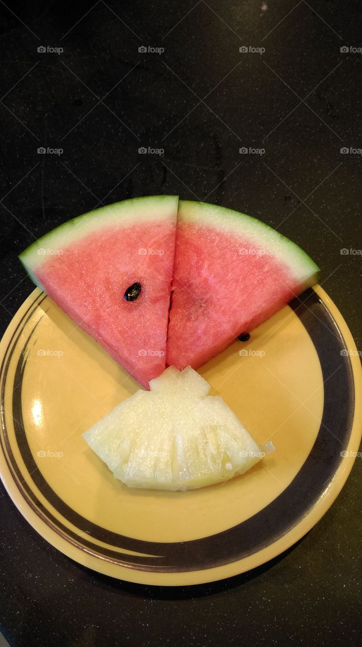 Oriental fresh fruits,slice water melon and pineapple.