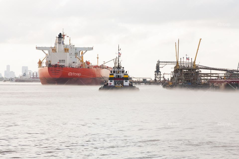 Ships at dock on Mississippi in foggy weather