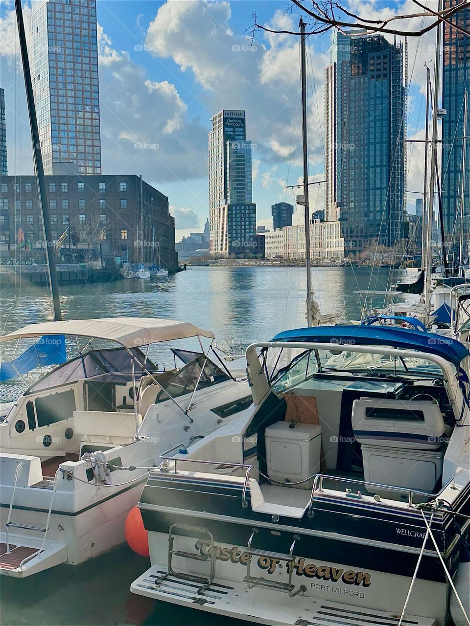 These are two of the beautiful boats that are tied to the shore here at “Newtown Creek” by the “Pulaski Bridge” in LIC, Queens. Across the water on the left we see “Greenpoint”, Bklyn and to the right LIC and “Manhattan”. 2023. Hypnotic Productions