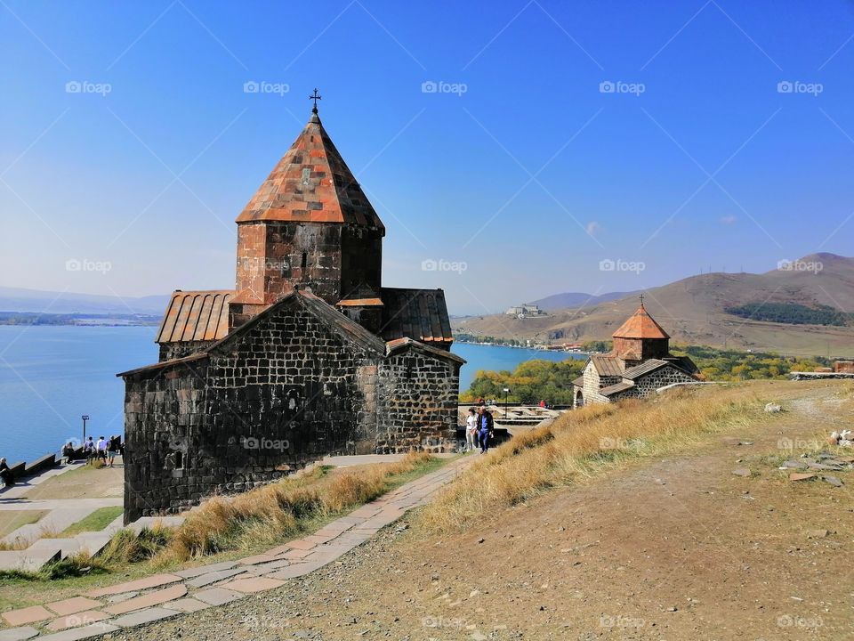 Church on the background of Lake Sevan