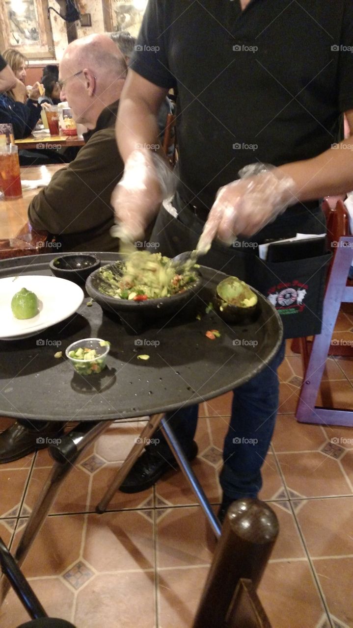 having some delicious guacamole made for us