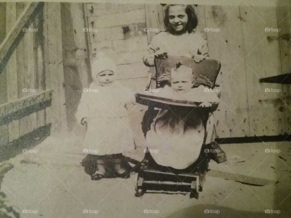 early 1900's with baby carriage