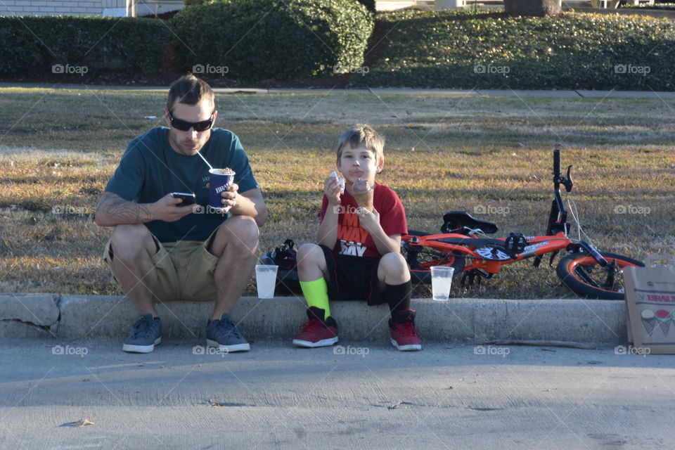 Father son ice cream ride, broken leg and all