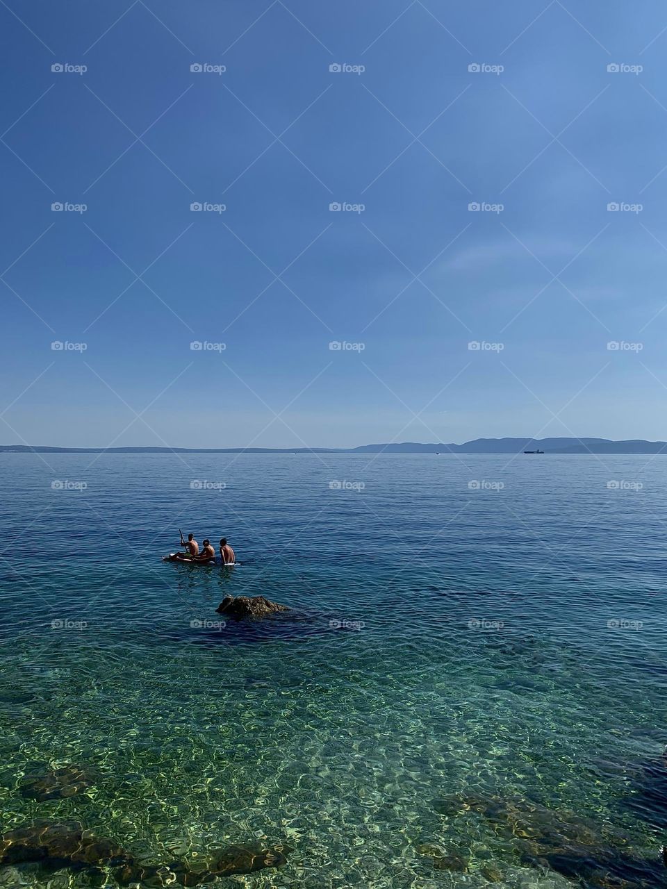 Boys floating towards an adveture