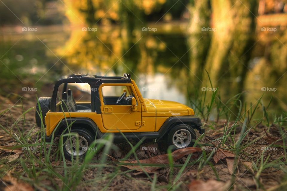 Jeep for extreme and traveler life. Find peace at the same time. With this yellow small jeep