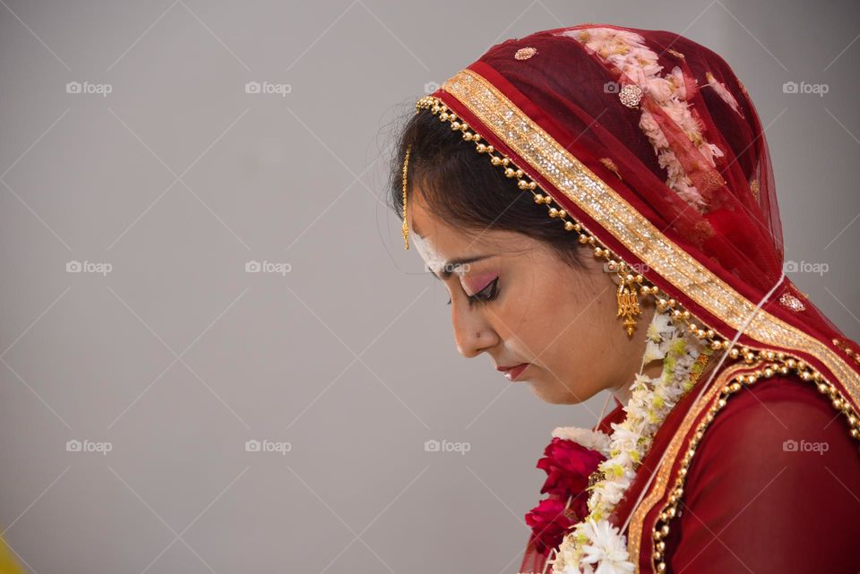 Portrait of a lady wearing heavy gold jewellery