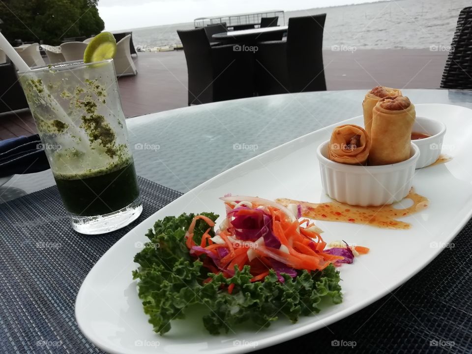 Spring rolls with vegetables salad