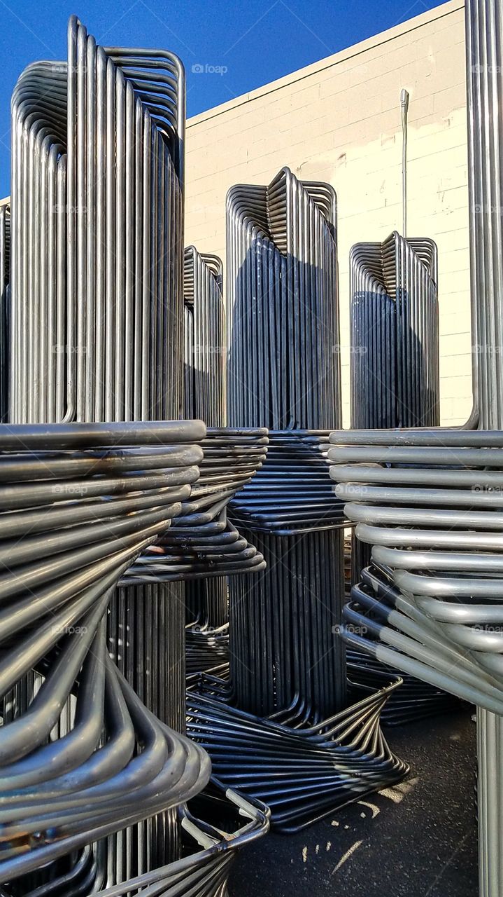 sculpturistic stacks of pipe, ready to ship