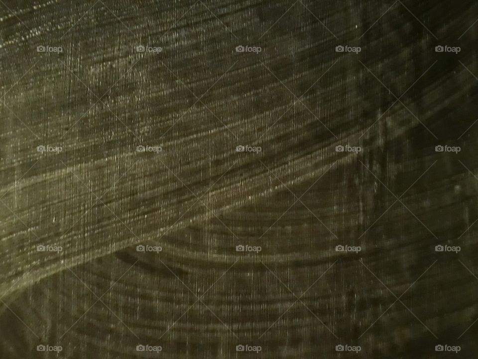 wiped chalk from a black board