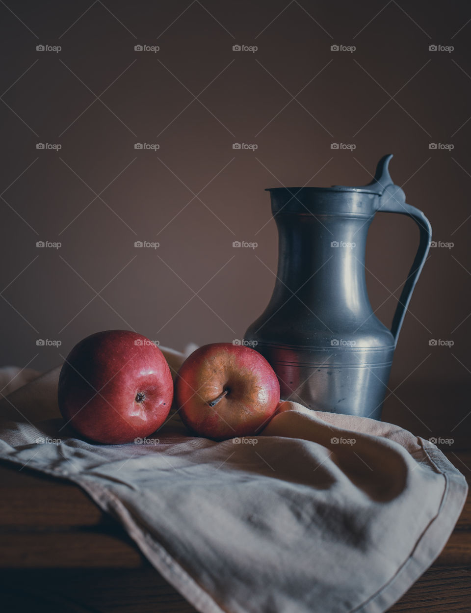Close-up of apples on table .