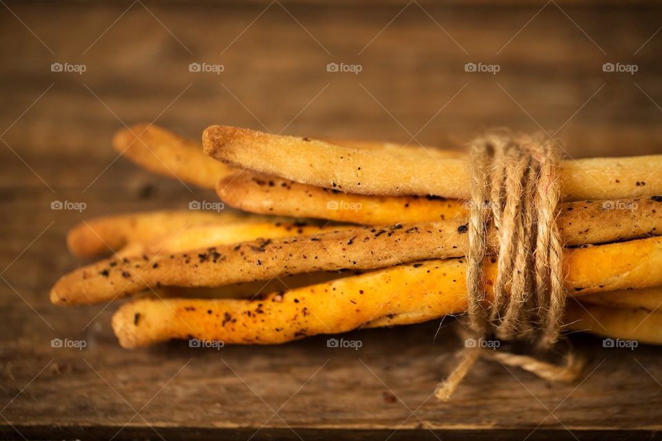 Bunch of baguettes on wooden table